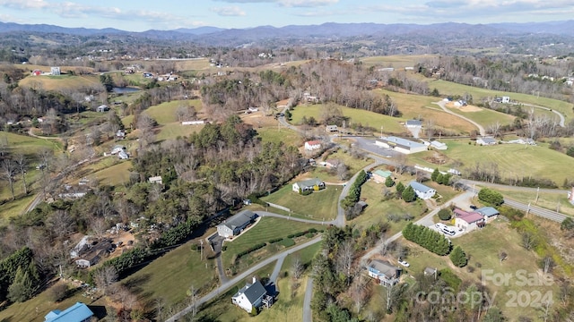 aerial view featuring a mountain view