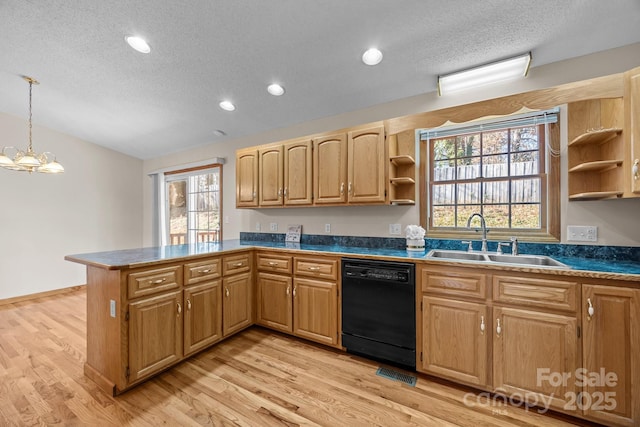 kitchen featuring a sink, open shelves, a textured ceiling, and dishwasher