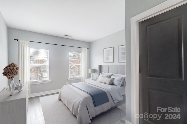 bedroom featuring light hardwood / wood-style floors