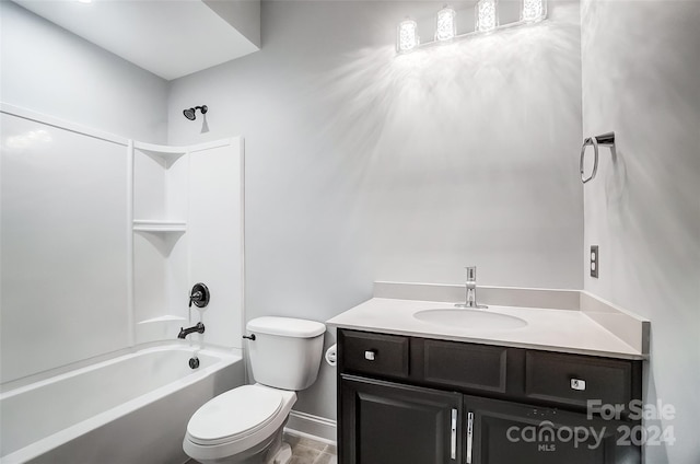 full bathroom featuring shower / bathing tub combination, vanity, and toilet