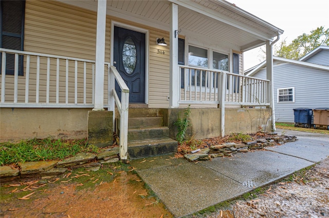 entrance to property with a porch