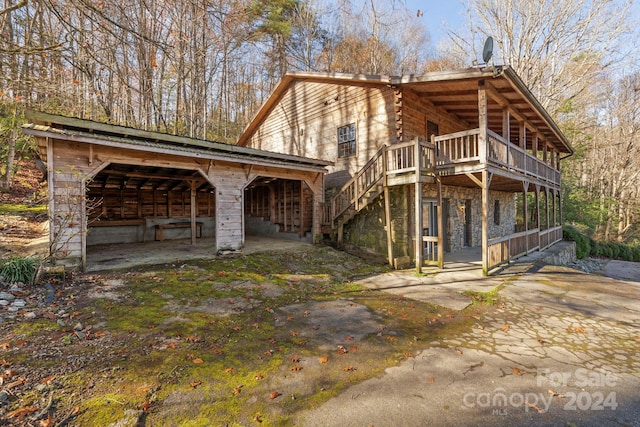 view of front of house with a deck