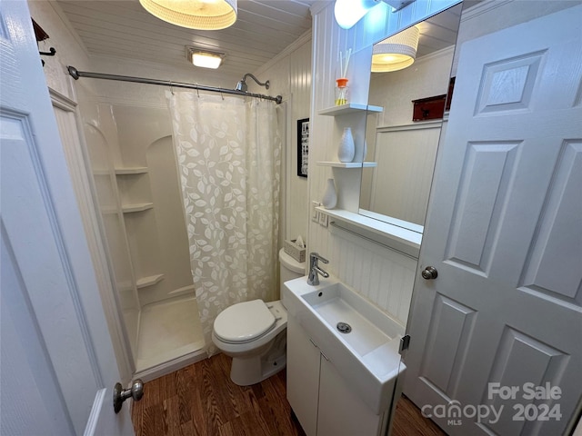 bathroom featuring hardwood / wood-style flooring, toilet, ornamental molding, walk in shower, and wood ceiling