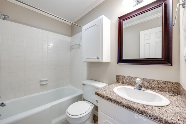 full bathroom with vanity, toilet, tiled shower / bath, and crown molding