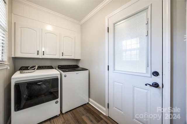 washroom featuring cabinets, washer and clothes dryer, dark hardwood / wood-style flooring, and ornamental molding