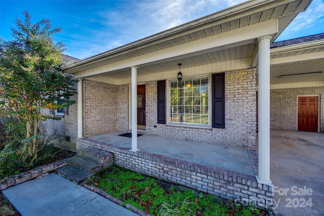 doorway to property featuring a porch