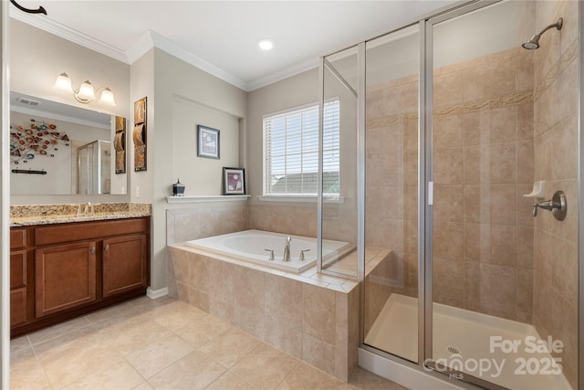 bathroom with a garden tub, crown molding, a shower stall, and vanity