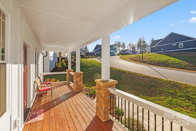 wooden deck featuring a porch