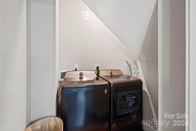 laundry area featuring washing machine and dryer