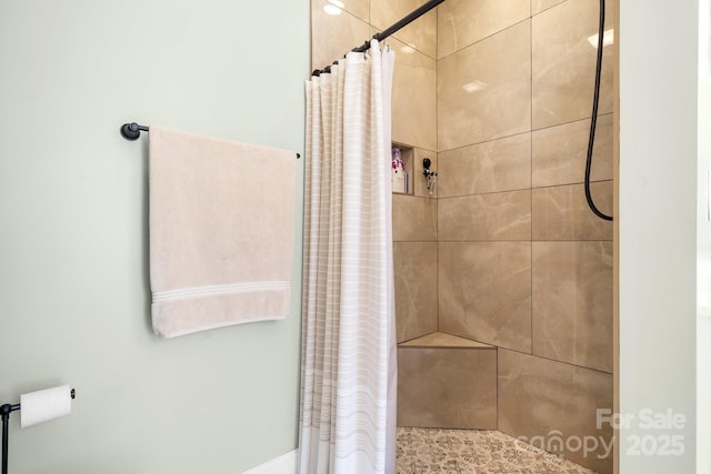 bathroom featuring walk in shower