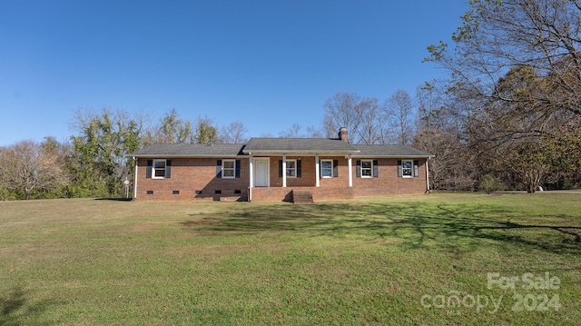 view of front of house with a front lawn