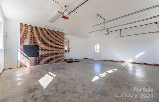 garage featuring a garage door opener