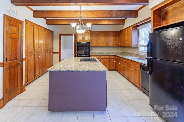 kitchen featuring hanging light fixtures, a center island, beamed ceiling, and black appliances