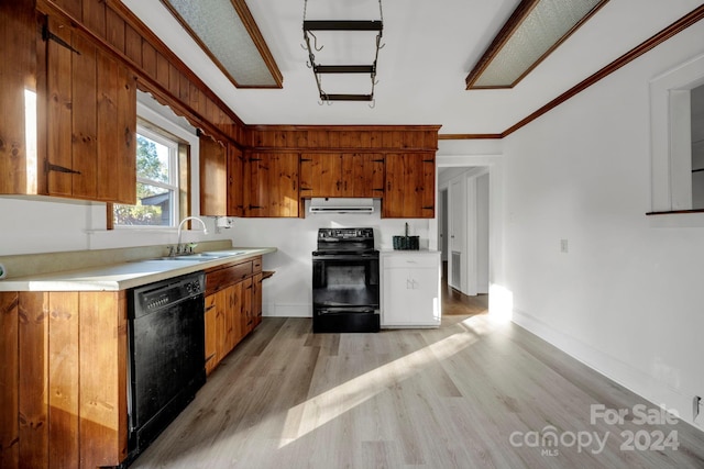 kitchen featuring black appliances, sink, light hardwood / wood-style flooring, ornamental molding, and extractor fan