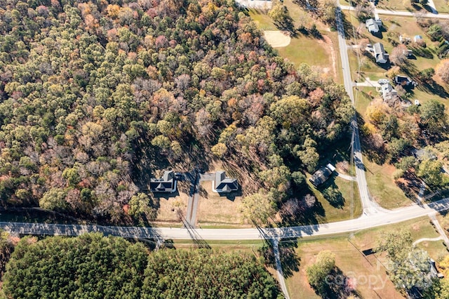 aerial view featuring a forest view