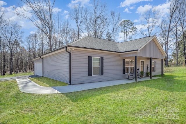 view of property exterior with a garage, covered porch, a shingled roof, and a lawn