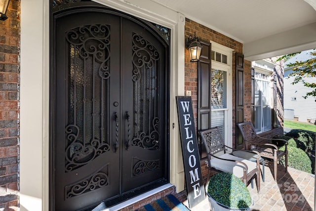 property entrance featuring french doors