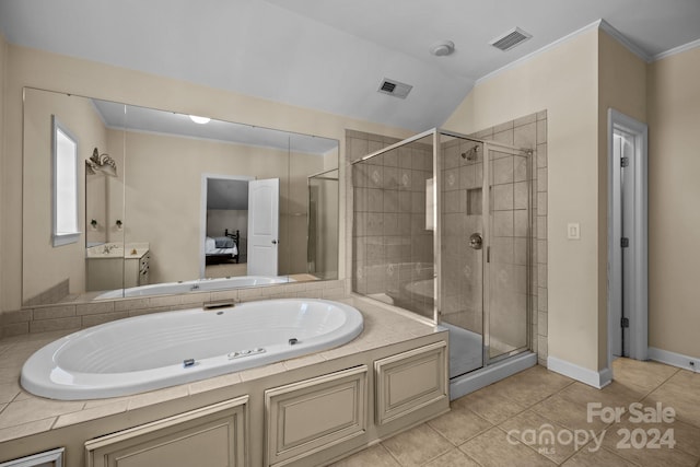 bathroom with vanity, plus walk in shower, vaulted ceiling, tile patterned flooring, and ornamental molding