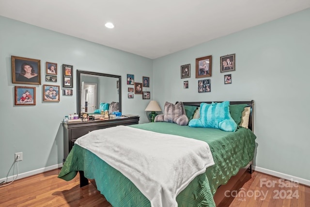 bedroom featuring hardwood / wood-style flooring