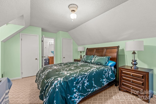 bedroom featuring lofted ceiling, a textured ceiling, and light colored carpet