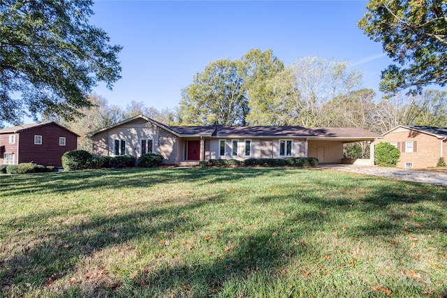 single story home with a front yard and a carport