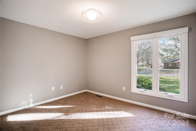 empty room with carpet floors