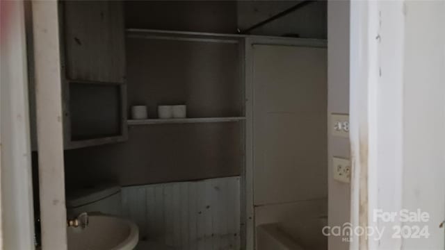 bathroom featuring toilet