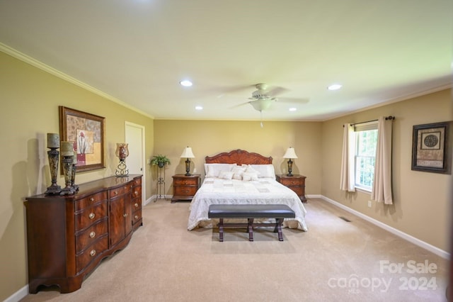 bedroom featuring ceiling fan, light colored carpet, and ornamental molding