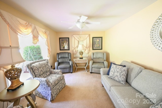 living room with light carpet and ceiling fan