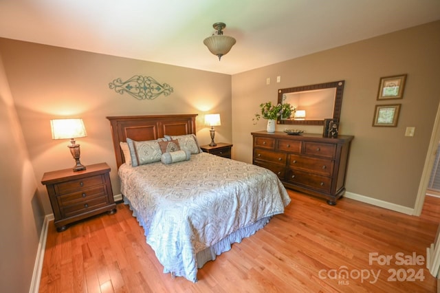 bedroom featuring light wood-type flooring