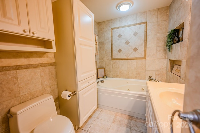 bathroom featuring tile patterned flooring, a bathtub, toilet, and tile walls