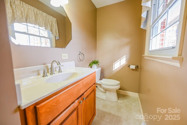183 Creekside Dr, Forest City, NC 28043 - bathroom featuring toilet, baseboards, tile patterned floors, and vanity