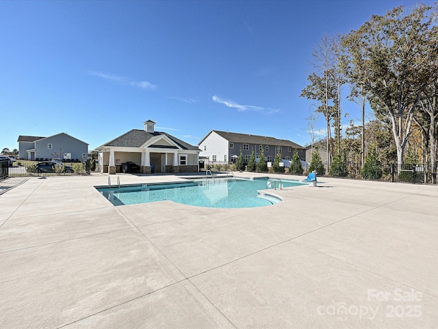 view of pool featuring a patio