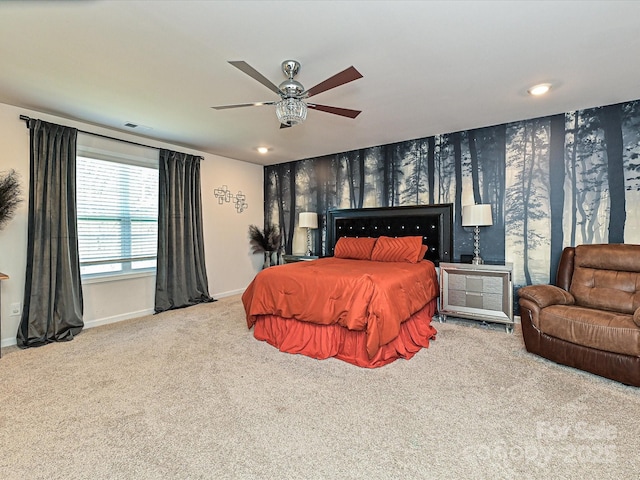 bedroom with ceiling fan and carpet floors