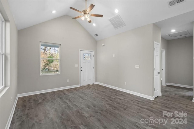 spare room featuring ceiling fan, dark hardwood / wood-style flooring, and high vaulted ceiling