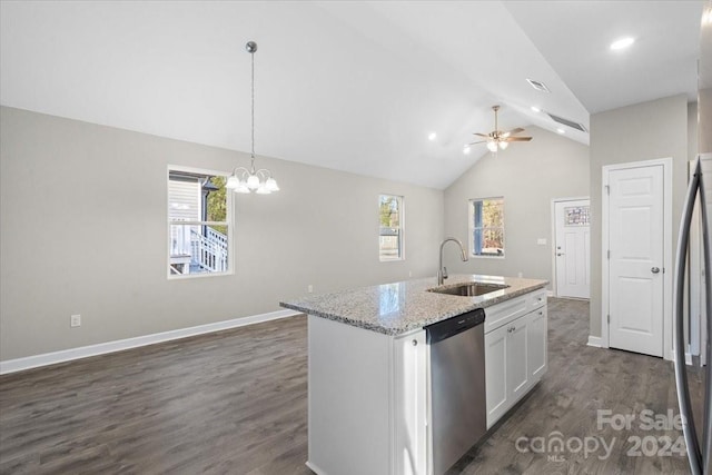 kitchen featuring stainless steel appliances, white cabinetry, a wealth of natural light, and sink