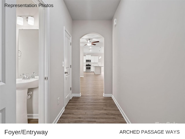 hallway with dark wood-type flooring