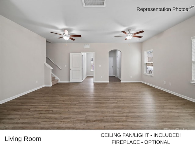 204 Lake George Dr, Shelby, NC 28152 - unfurnished living room featuring ceiling fan, arched walkways, wood finished floors, and baseboards