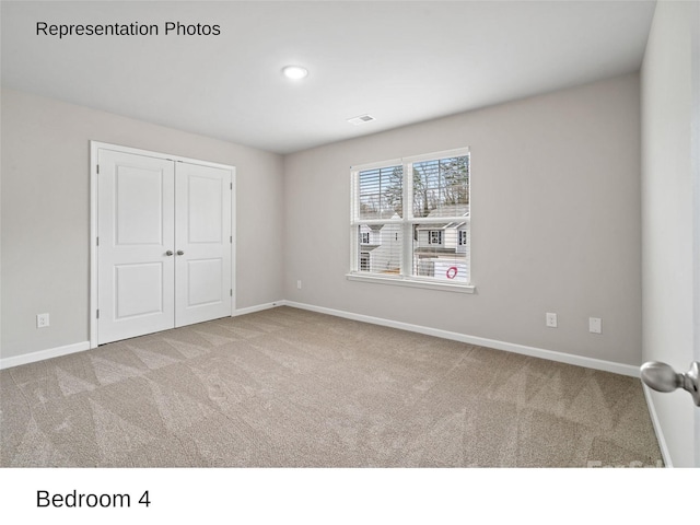 204 Lake George Dr, Shelby, NC 28152 - unfurnished bedroom featuring carpet floors, baseboards, a closet, and recessed lighting