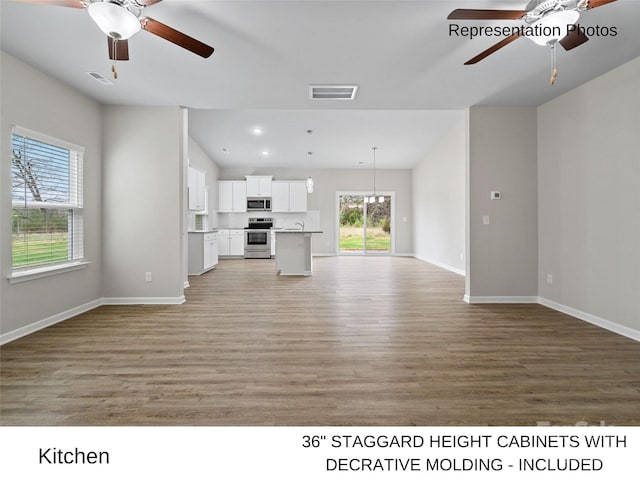 204 Lake George Dr, Shelby, NC 28152 - unfurnished living room with a ceiling fan, light wood-type flooring, baseboards, and recessed lighting