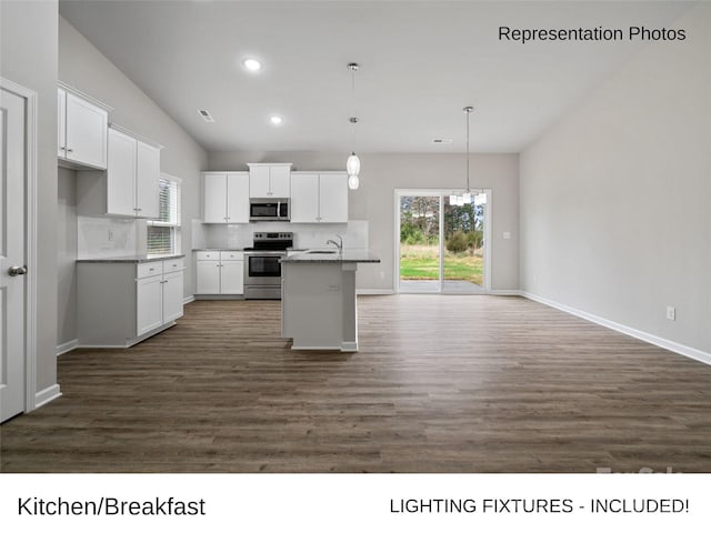 204 Lake George Dr, Shelby, NC 28152 - kitchen with stainless steel appliances, decorative backsplash, white cabinets, recessed lighting, and dark wood-style flooring