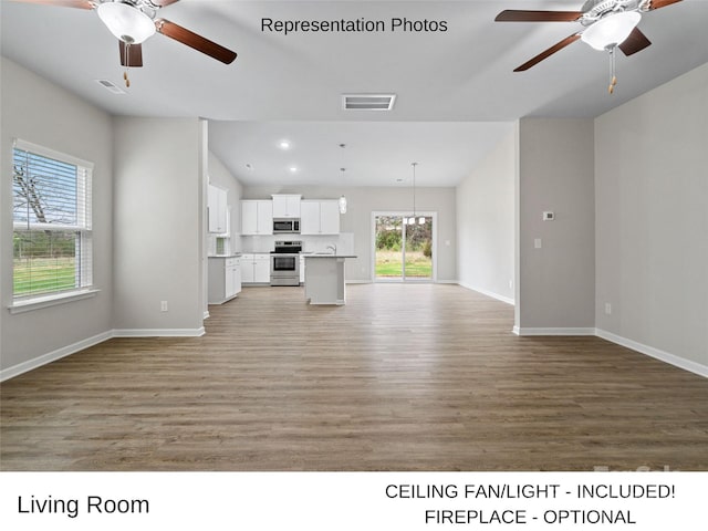 204 Lake George Dr, Shelby, NC 28152 - unfurnished living room with a ceiling fan, light wood-style floors, baseboards, and recessed lighting