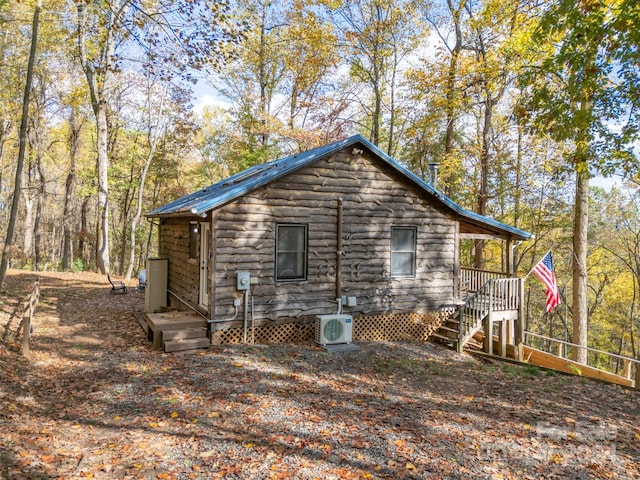 exterior space with ac unit