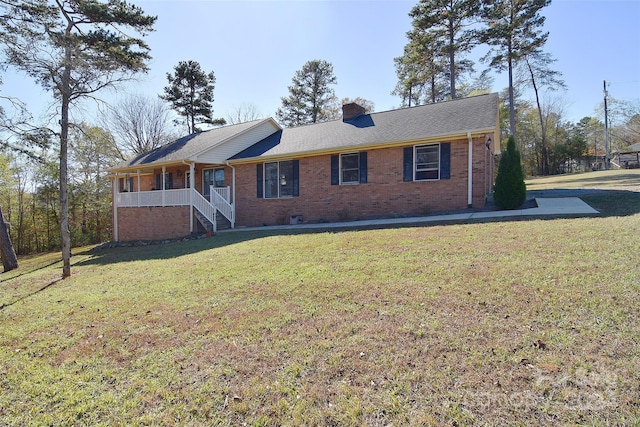 ranch-style home with a front yard