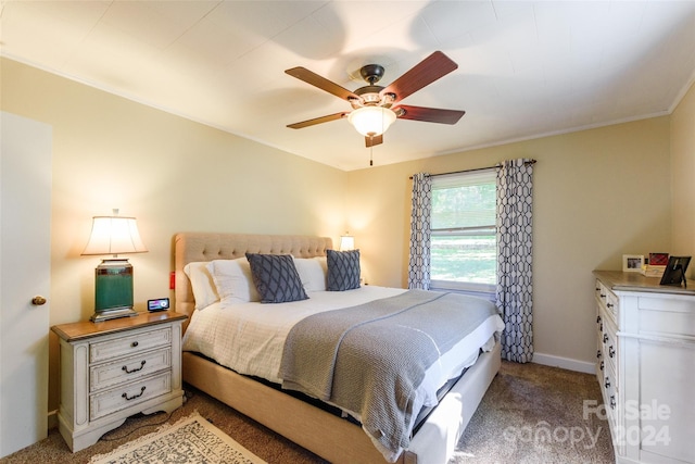 bedroom with carpet flooring, ceiling fan, and ornamental molding