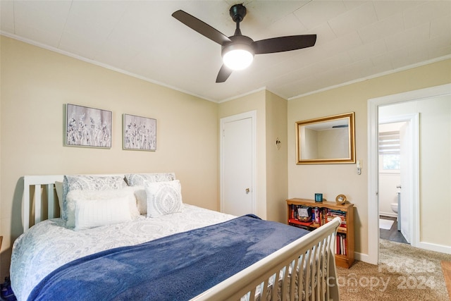 bedroom with ceiling fan, crown molding, and carpet