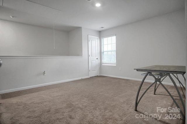 unfurnished room with carpet flooring