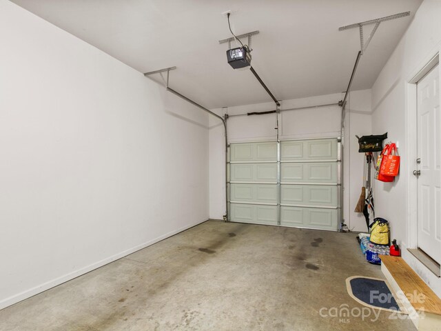 garage featuring a garage door opener