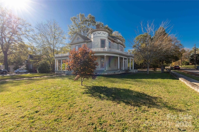 view of home's exterior featuring a lawn