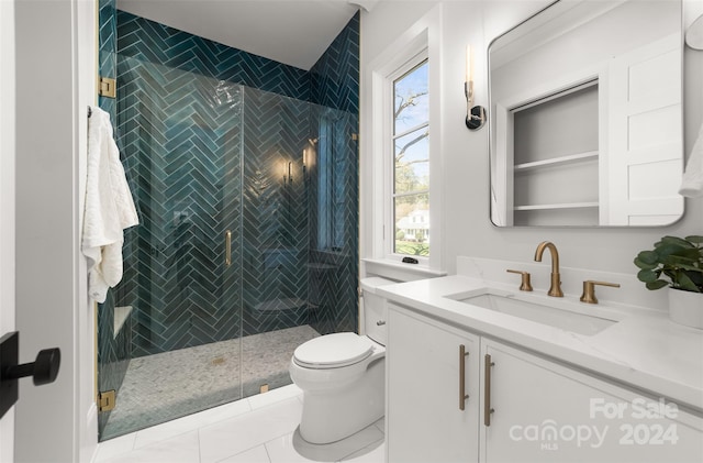 bathroom with toilet, vanity, tile patterned floors, and a shower with door